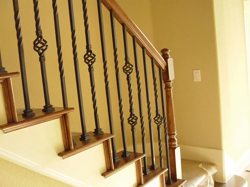 Staircase makeover with hardwood and iron